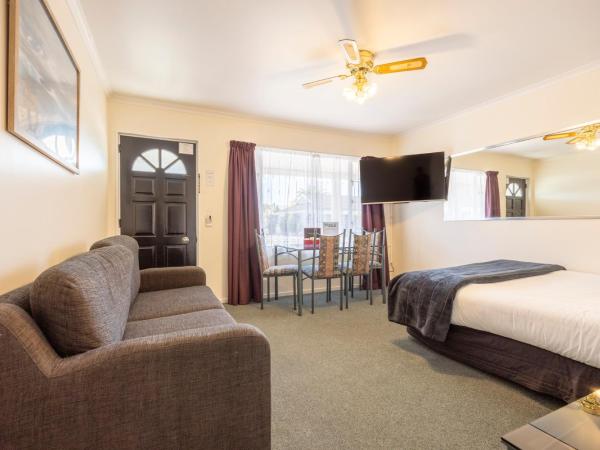 ASURE PRINCE motor lodge : photo 1 de la chambre appartement 1 chambre familial avec baignoire spa 