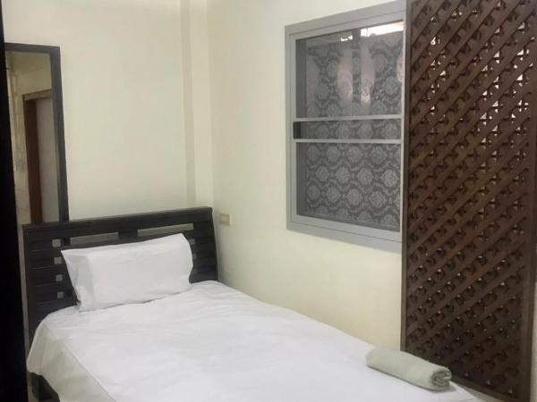 SJ House : photo 3 de la chambre chambre lits jumeaux standard avec vue sur jardin