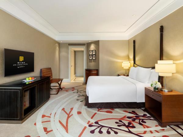Jin Jiang Hotel : photo 2 de la chambre chambre lit king-size deluxe - cathay garden