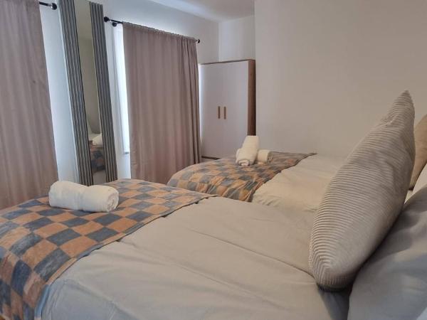 King's Cross Road Private Rooms : photo 2 de la chambre chambre triple avec salle de bains commune