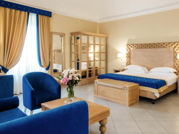 Villa Tolomei Hotel & Resort : photo 1 de la chambre chambre double deluxe