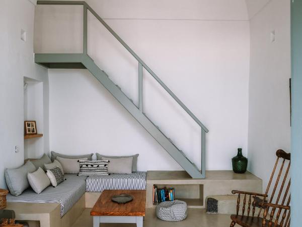 Spitia Santorini Villa Collection : photo 8 de la chambre la maison troglodyte - vue sur volcan