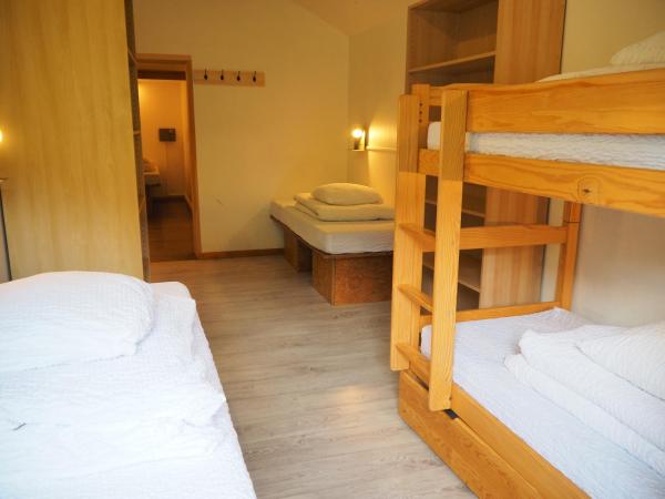 Auberge de Jeunesse HI La Clusaz : photo 5 de la chambre lit simple dans dortoir pour femmes