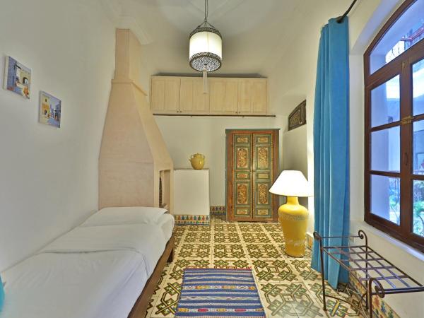 Riad Villa Garance : photo 4 de la chambre chambre triple confort avec douche