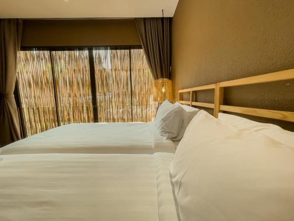 Historykan Kanchanaburi Hotel : photo 4 de la chambre chambre quadruple deluxe