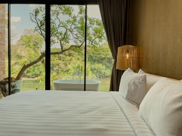 Historykan Kanchanaburi Hotel : photo 7 de la chambre chambre quadruple deluxe