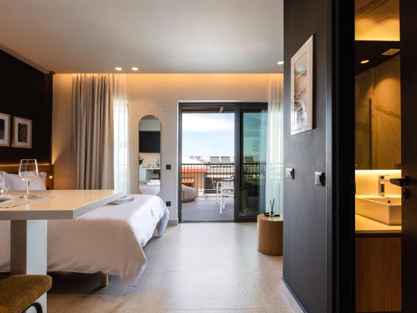 Porta Suites : photo 7 de la chambre suite junior avec jacuzzi extérieur - vue sur mer