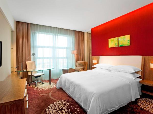 Four Points by Sheraton Qingdao, Chengyang : photo 1 de la chambre grande chambre lit king-size deluxe - vue sur ville