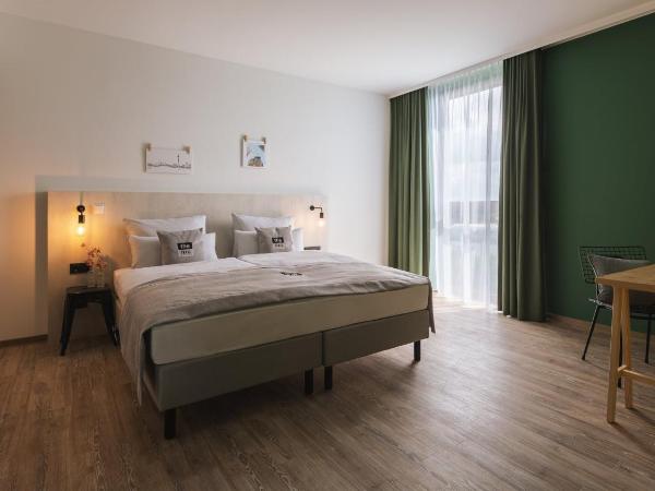 Holiday Inn - the niu Tab Dusseldorf Main Station, an IHG Hotel : photo 6 de la chambre chambre lit queen-size standard - accessible aux personnes à mobilité réduite