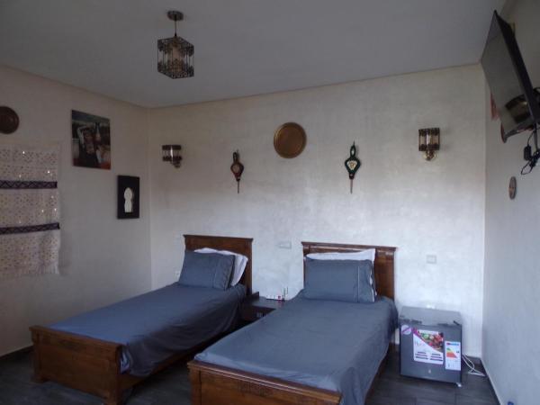 Jnane Ville Verte : photo 6 de la chambre chambre double ou lits jumeaux - vue sur jardin