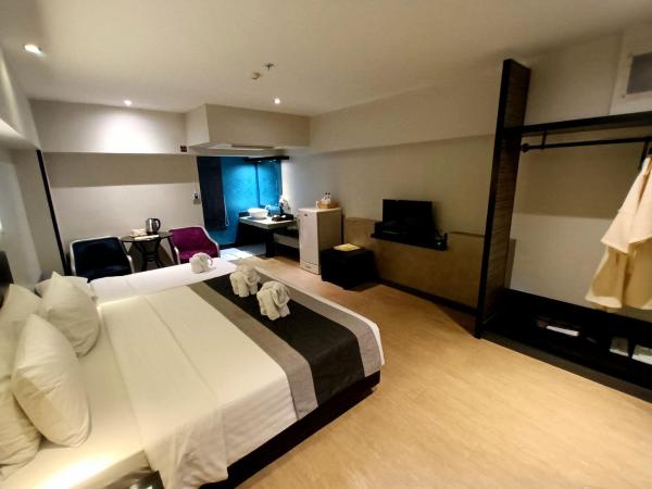 Nouvo City Hotel : photo 4 de la chambre chambre triple supérieure