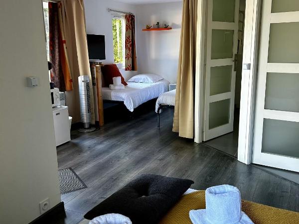 Les Chalets du Périgord : photo 3 de la chambre chambre quadruple premium