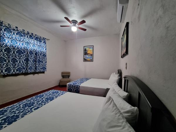 HOTEL PUERTO MORELOS cuernavaca : photo 2 de la chambre chambre standard avec 2 lits queen-size
