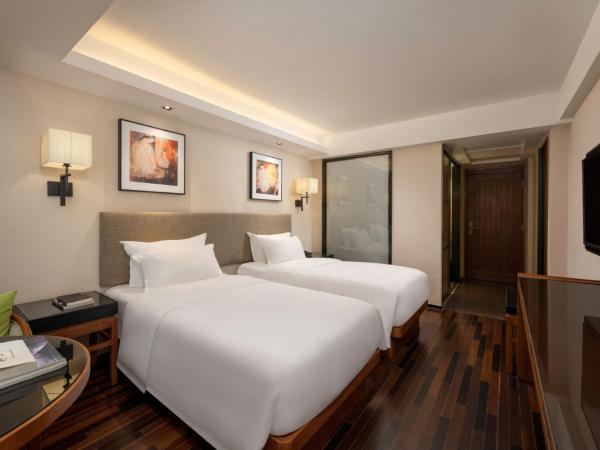 Sanya Great East Sea Junting Hotel : photo 2 de la chambre chambre lits jumeaux deluxe