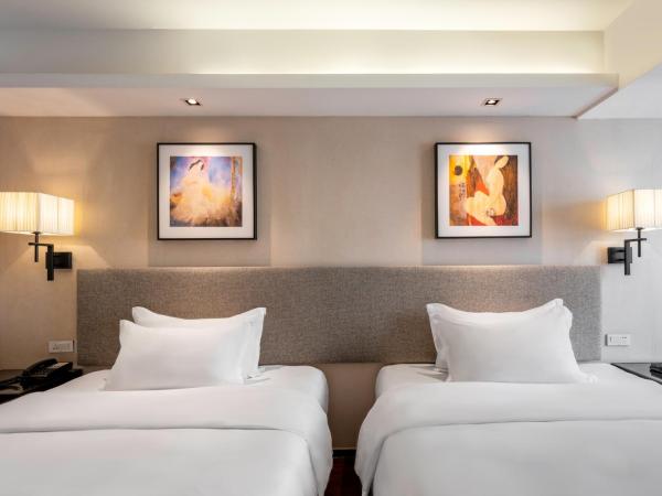 Sanya Great East Sea Junting Hotel : photo 2 de la chambre chambre familiale