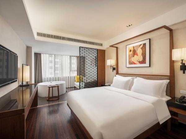 Sanya Great East Sea Junting Hotel : photo 1 de la chambre chambre lit king-size