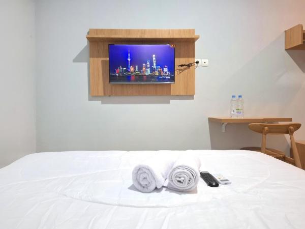 Daffa Inn Syariah near Jogja City Mall mitra RedDoorz : photo 8 de la chambre chambre double standard