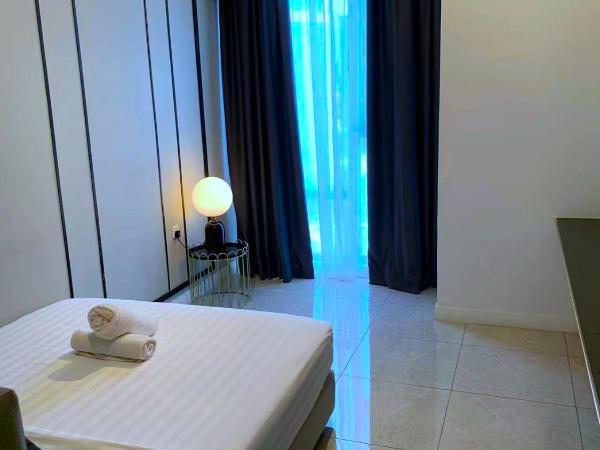 Axon Residence Near Pavilion : photo 1 de la chambre chambre double Économique