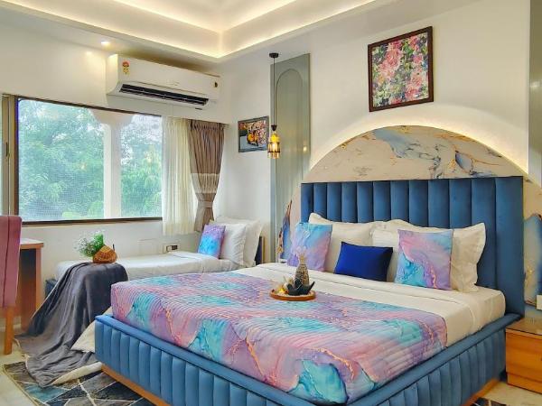 Hotel Sarang Palace - Boutique Stays : photo 1 de la chambre premier triple room with daybed