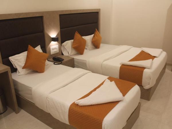 Hotel Metro Inn : photo 6 de la chambre chambre triple deluxe