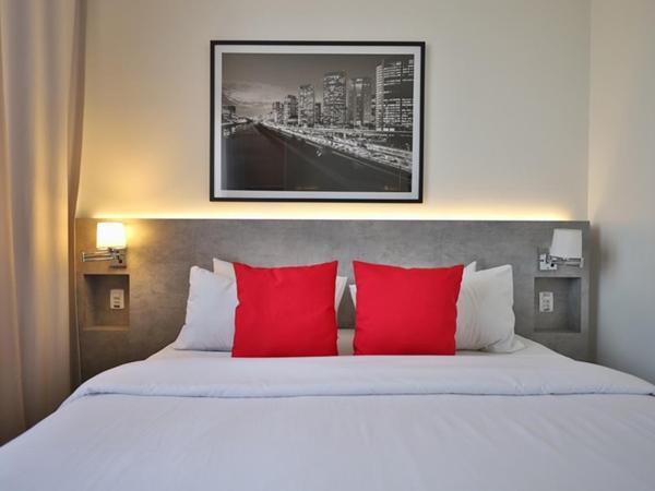 Ramada Encore Sao Paulo Tiradentes Centro : photo 1 de la chambre chambre lit king-size