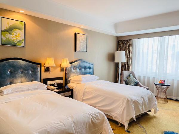 Ramada Plaza Tianlu Hotel : photo 2 de la chambre chambre lits jumeaux deluxe