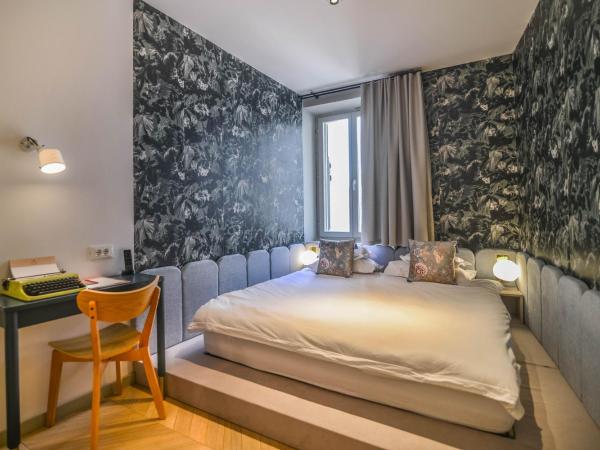 The Melegran : photo 10 de la chambre deluxe double room with external access (2 adults + 1 child)