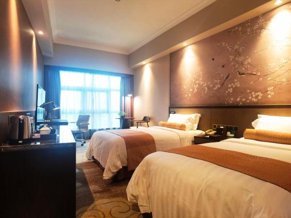 Jin Jiang Pine City Hotel : photo 3 de la chambre chambre lits jumeaux supérieure