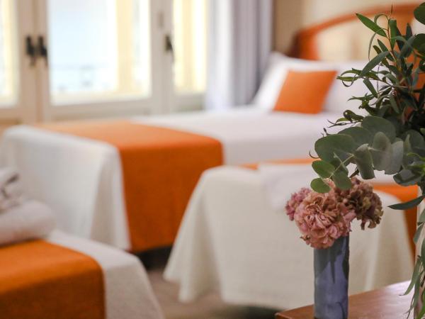 Hostal San Lorenzo : photo 5 de la chambre chambre quadruple (4 adultes)