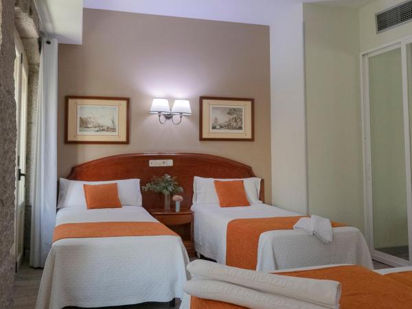 Hostal San Lorenzo : photo 9 de la chambre chambre quadruple (4 adultes)
