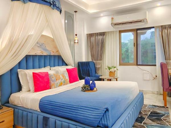 Hotel Sarang Palace - Boutique Stays : photo 3 de la chambre luxurious bathtub room with canopy