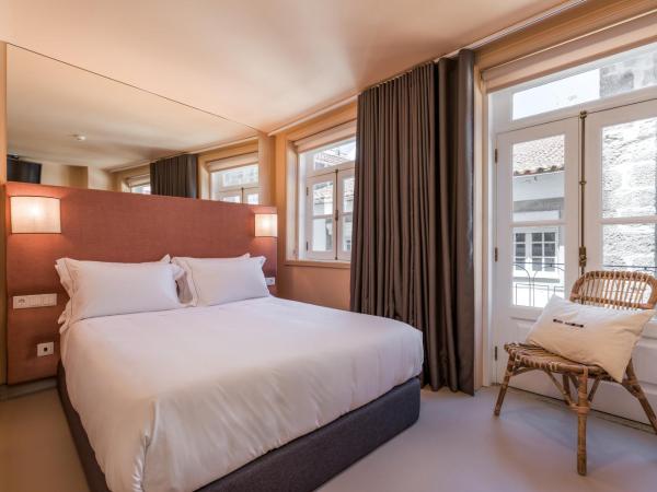 Hotel Margarida Da Praça : photo 1 de la chambre chambre simple - vue sur ville