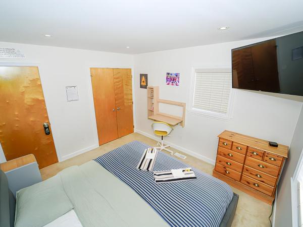 Illuminati Guest House : photo 2 de la chambre chambre lit king-size - vue sur jardin