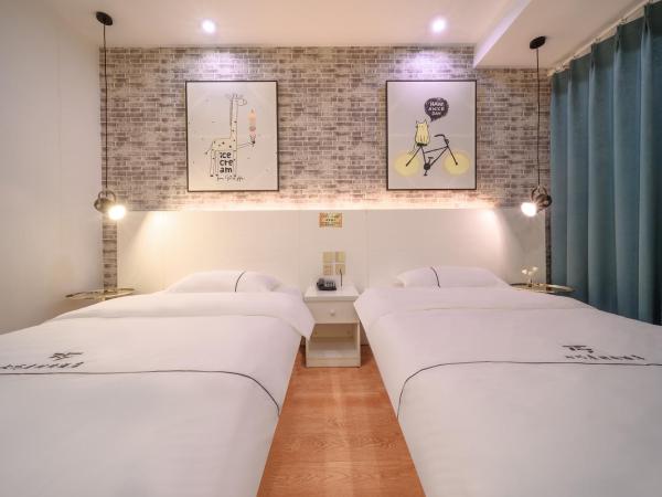 QiQiaoWu Fashion Hotel - Beijing Songjiazhuang Subway Station : photo 5 de la chambre chambre lits jumeaux deluxe