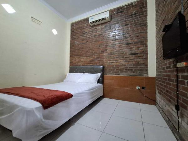 OYO 94245 Alya Homestay Syariah : photo 4 de la chambre chambre double deluxe