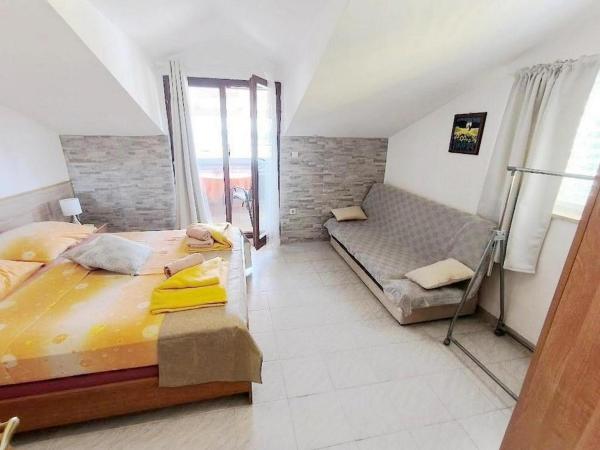 Rooms and Apartments Porto del Mar B & B : photo 9 de la chambre appartement 2 chambres avec terrasse et vue sur la mer