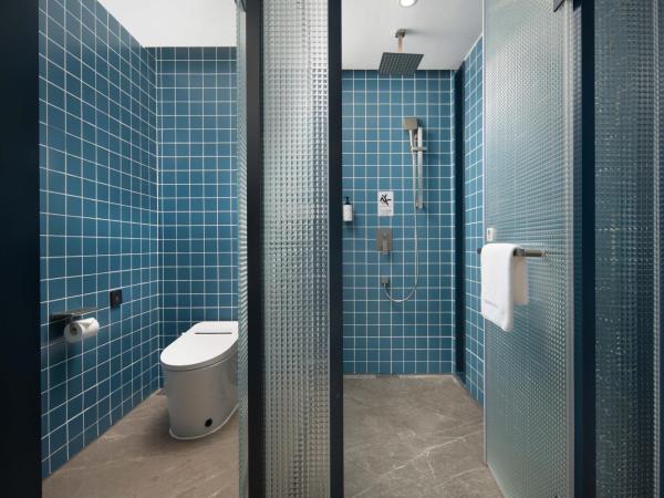 广州番禺万博中心舒与酒店 : photo 6 de la chambre chambre lit queen-size