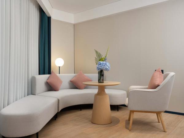 广州番禺万博中心舒与酒店 : photo 2 de la chambre studio avec baignoire spa