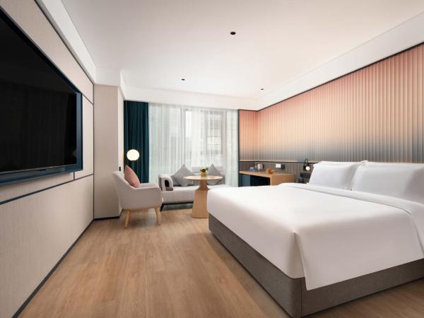 广州番禺万博中心舒与酒店 : photo 5 de la chambre chambre lit queen-size deluxe