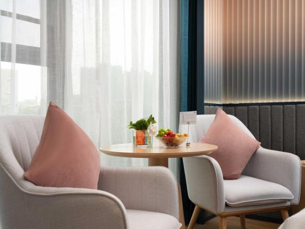 广州番禺万博中心舒与酒店 : photo 4 de la chambre chambre deluxe double ou lits jumeaux