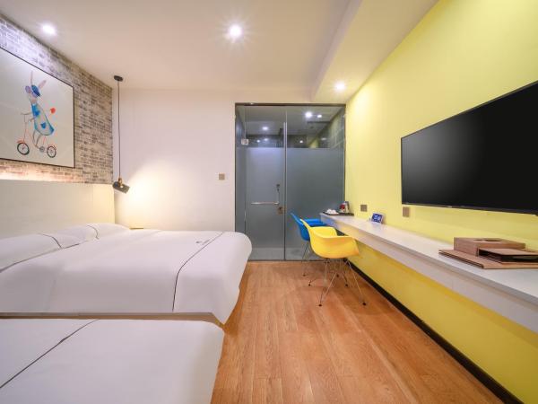 QiQiaoWu Fashion Hotel - Beijing Songjiazhuang Subway Station : photo 2 de la chambre chambre lits jumeaux deluxe