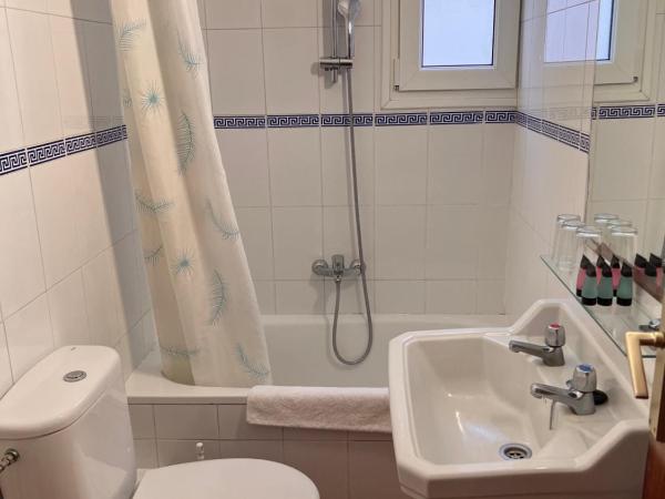 Hotel Caleta : photo 1 de la chambre chambre triple