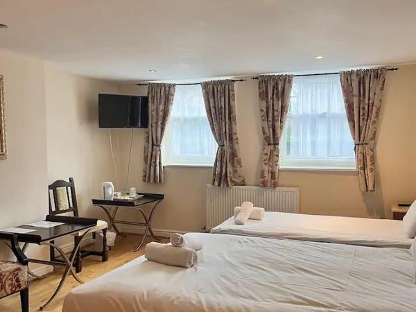 Sheil Suites : photo 3 de la chambre chambre lits jumeaux supérieure