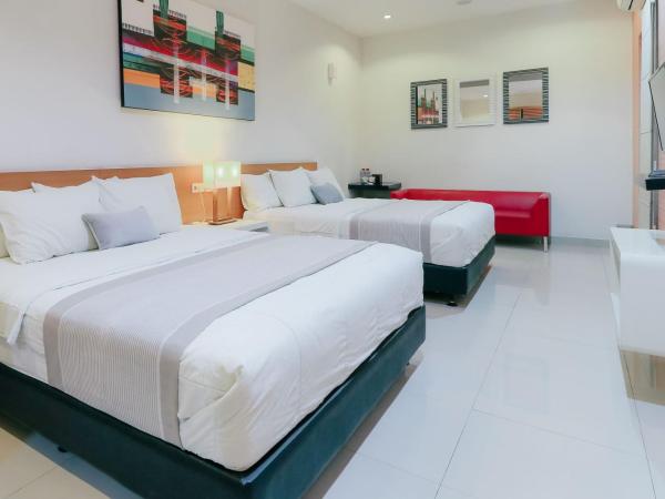 HOME Guesthouse : photo 1 de la chambre chambre familiale