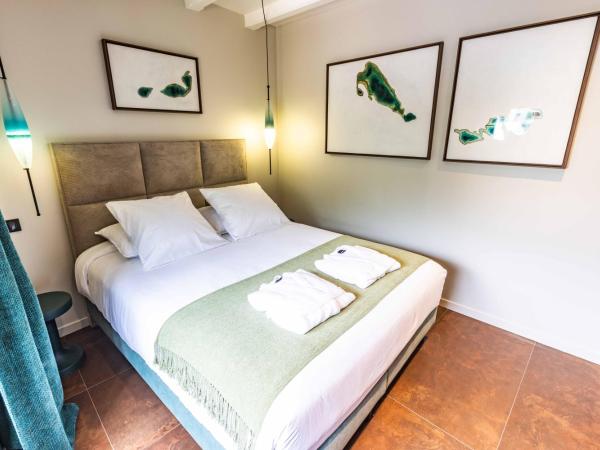 La Sainthilarienne : photo 10 de la chambre chambre supérieure lit queen-size