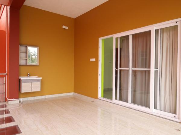 Sree Sri Residency ECR : photo 4 de la chambre chambre familiale supérieure