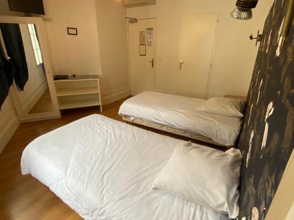 Logis Hôtel de la Tour : photo 2 de la chambre chambre lits jumeaux