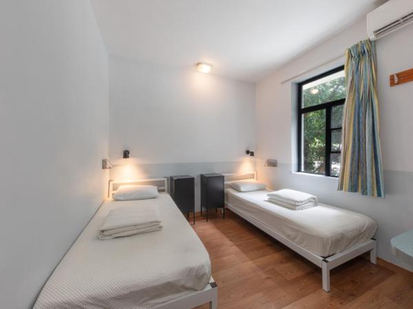 Shenzhen Loft Youth Hostel : photo 2 de la chambre single bed in girl's dormitory room