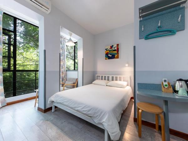 Shenzhen Loft Youth Hostel : photo 1 de la chambre chambre lit queen-size 