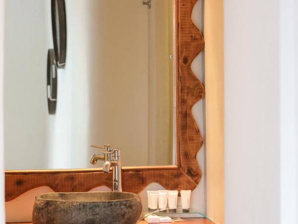 Ibiscus Boutique : photo 10 de la chambre suite junior avec jacuzzi intérieur